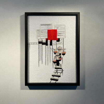 A stretched thread painting in a smooth black wooden frame